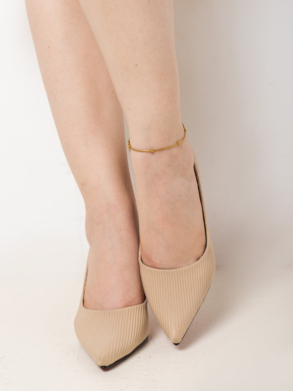 Beige Velora Pointed-Toe Pumps